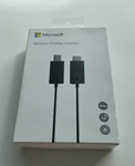 Microsoft Wireless Display Adapter - Brand New Sealed. Fixed Price $199.00.