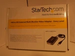 Startech USB2DVIE2 To External Video Multi Moniter Adapter New Open Box. Fixed Price $18.00.
